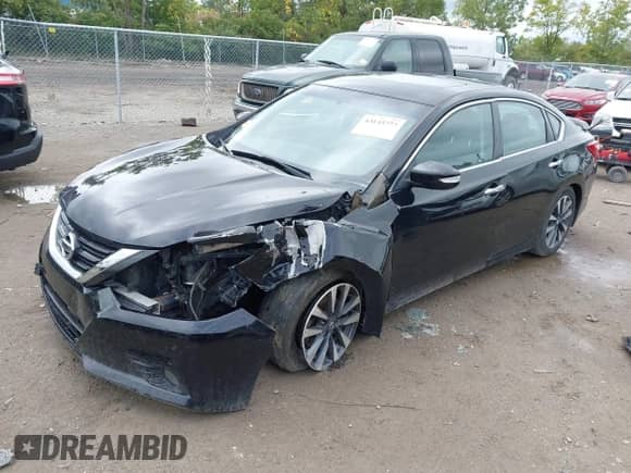 2016 Nissan Altima S z VIN 1N4AL3AP8GC220946, wystawiony jako IAAI lot #43133772 z przebiegiem 162 877 mil mil oraz . Historia ofert i sprzedaży dostępna na DreamBid. Obrazek 2.