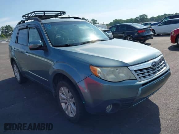 2012 Subaru Forester X Limited z VIN JF2SHBEC0CH420297, wystawiony jako IAAI lot #42468792 z przebiegiem 170 820 mil mil oraz . Historia ofert i sprzedaży dostępna na DreamBid. Obrazek 1.