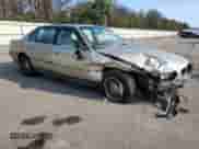 1997 BMW 7 Series 740iL with VIN WBAGJ8325VDM04352, listed as a Copart auction lot 70189534 with 129,463 mi miles and Salvage title. Bid and sale history available at DreamBid. Image 4.