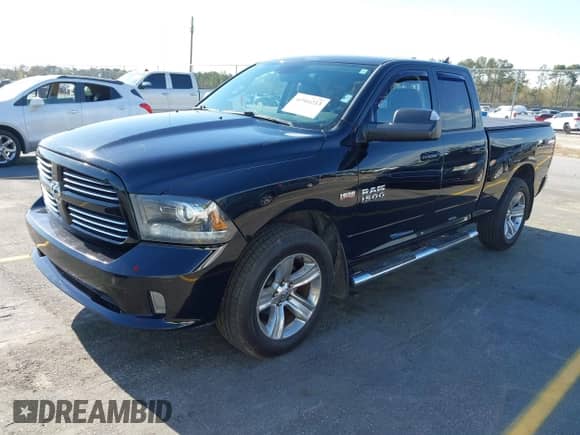 2014 Ram 1500 Sport with VIN 1C6RR7HT0ES182760, listed as a IAAI auction lot 41904213 with 202,466 mi miles and . Bid and sale history available at DreamBid. Image 2.