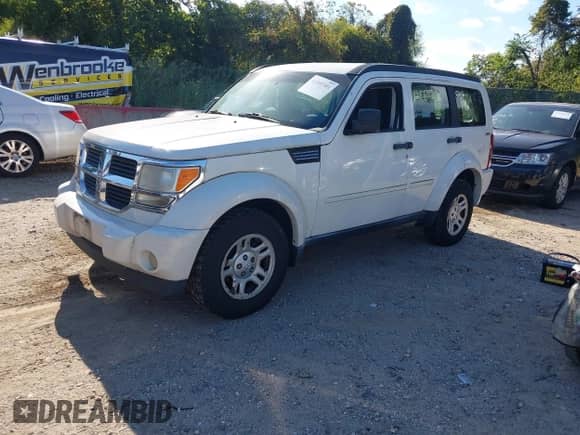 2009 Dodge Nitro SE z VIN 1D8GU28K59W525992, wystawiony jako IAAI lot #43391581 z przebiegiem 180 411 mil mil oraz . Historia ofert i sprzedaży dostępna na DreamBid. Obrazek 2.