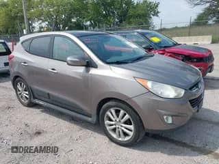 2012 Hyundai Tucson GLS with VIN KM8JU3AC0CU362762, listed as a IAAI auction lot 42884271 with 214,783 mi miles and . Bid and sale history available at DreamBid. Image 1.