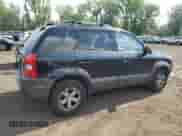 2009 Hyundai Tucson Limited with VIN KM8JN72D09U986534, listed as a Copart auction lot 62516985 with 153,253 mi miles and Salvage title. Bid and sale history available at DreamBid. Image 3.