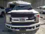 2018 Ford F-250 XL with VIN 1FT7W2B61JEB59768, listed as a Copart auction lot 82266435 with 220,401 mi miles and Salvage title. Bid and sale history available at DreamBid. Image 5.