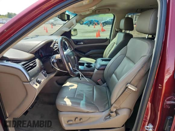 2016 Chevrolet Tahoe LT with VIN 1GNSCBKCXGR311662, listed as a Copart auction lot 65987115 with 168,117 mi miles and Salvage title. Bid and sale history available at DreamBid. Image 7.