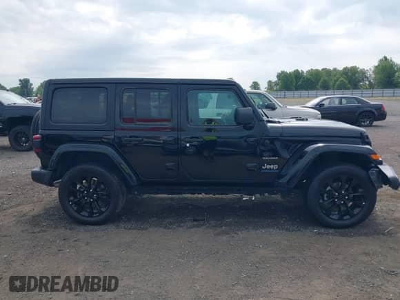 2023 Jeep Wrangler Sahara with VIN 1C4JJXP62PW628735, listed as a IAAI auction lot 42683940 with 46,534 mi miles and . Bid and sale history available at DreamBid. Image 13.