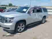 2018 Chevrolet Suburban LT z VIN 1GNSCHKC7JR317414, wystawiony jako IAAI lot #42874214 z przebiegiem 98 281 mil mil oraz . Historia ofert i sprzedaży dostępna na DreamBid. Obrazek 17.