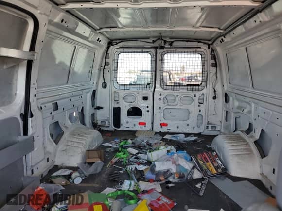 2012 Ford Econoline Cargo Commercial with VIN 1FTNE1EW6CDA43779, listed as a Copart auction lot 67649835 with 78,990 mi miles and Salvage title. Bid and sale history available at DreamBid. Image 10.