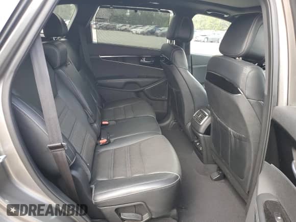 2016 Kia Sorento SX с VIN 5XYPK4A59GG023257, выставлен на аукционе Copart как лот 85168795 с пробегом 176 510 миль миль и Списание • Salvage title. История ставок и продаж доступна на DreamBid. Изображение 11.