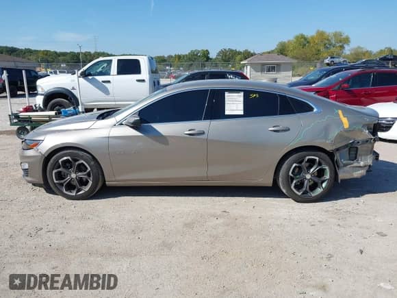 2022 Chevrolet Malibu LT z VIN 1G1ZD5ST7NF167565, wystawiony jako IAAI lot #43365428 z przebiegiem 52 285 mil mil oraz . Historia ofert i sprzedaży dostępna na DreamBid. Obrazek 14.