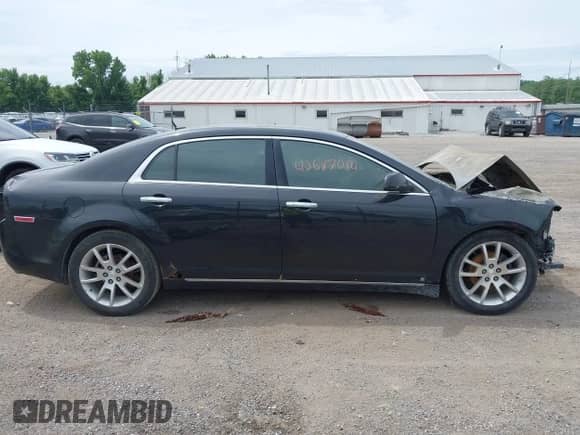 2009 Chevrolet Malibu LTZ with VIN 1G1ZK57799F231693, listed as a IAAI auction lot 42687084 with Not provided miles and . Bid and sale history available at DreamBid. Image 14.