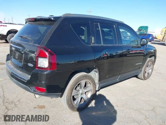 2016 Jeep Compass High Altitude with VIN 1C4NJCEA2GD761735, listed as a IAAI auction lot 41404892 with 114,129 mi miles and . Bid and sale history available at DreamBid. Image 4.