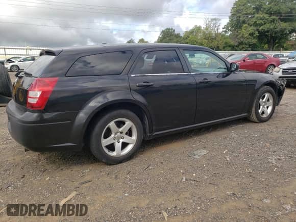 2007 Dodge Magnum с VIN 2D4FV47T77H739135, выставлен на аукционе Copart как лот 72145074 с пробегом 203 623 миль миль и Списание • Salvage title. История ставок и продаж доступна на DreamBid. Изображение 3.