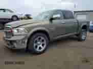 2014 Ram 1500 Laramie with VIN 1C6RR7NT3ES453198, listed as a Copart auction lot 80993835 with 79,321 mi miles and Salvage title. Bid and sale history available at DreamBid. Image 1.