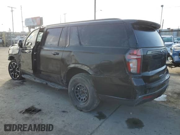 2022 Chevrolet Suburban RST с VIN 1GNSCEKD8NR205606, выставлен на аукционе Copart как лот 43213945 с пробегом Не указан миль и Списание • Salvage title. История ставок и продаж доступна на DreamBid. Изображение 2.