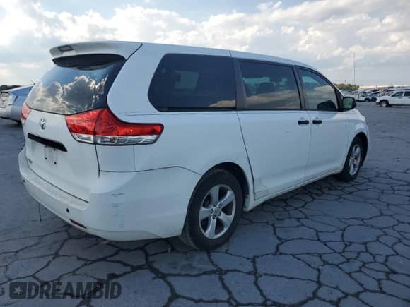 2012 Toyota Sienna with VIN 5TDZK3DC2CS184186, listed as a Copart auction lot 71013535 with 172,772 mi miles and Salvage title. Bid and sale history available at DreamBid. Image 3.