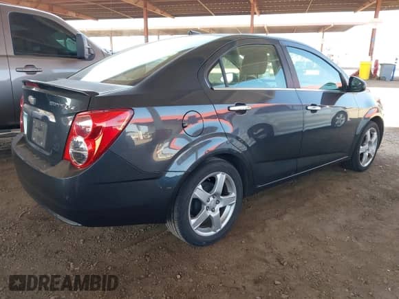 2014 Chevrolet Sonic LTZ с VIN 1G1JE5SG3E4125029, выставлен на аукционе IAAI как лот 42475314 с пробегом 153 830 миль миль и . История ставок и продаж доступна на DreamBid. Изображение 4.