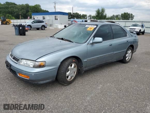 1995 Honda Accord with VIN 1HGCE6660SA003024, listed as a Copart auction lot 66928635 with 95,299 mi miles and Salvage title. Bid and sale history available at DreamBid. Image 1.