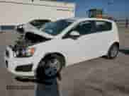 2014 Chevrolet Sonic LT z VIN 1G1JC6SGXE4103170, wystawiony jako Copart lot #67769315 z przebiegiem Nie podano mil oraz Szkoda całkowita • Salvage title. Historia ofert i sprzedaży dostępna na DreamBid. Obrazek 1.