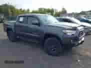 2021 Toyota Tacoma SR with VIN 3TMCZ5AN7MM383352, listed as a IAAI auction lot 43246296 with 44,937 mi miles and . Bid and sale history available at DreamBid. Image 1.
