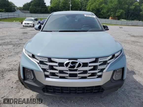 2024 Hyundai Santa Cruz SE с VIN 5NTJADAE8RH095735, выставлен на аукционе Copart как лот 56501585 с пробегом 19 485 миль миль и Списание • Salvage title. История ставок и продаж доступна на DreamBid. Изображение 5.