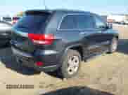 2013 Jeep Grand Cherokee Limited z VIN 1C4RJFBG4DC648995, wystawiony jako IAAI lot #43338050 z przebiegiem 138 551 mil mil oraz . Historia ofert i sprzedaży dostępna na DreamBid. Obrazek 4.