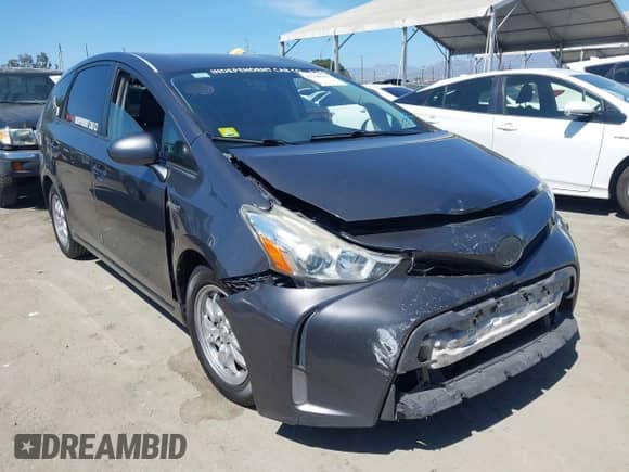 2015 Toyota Prius Two z VIN JTDZN3EU1FJ023490, wystawiony jako IAAI lot #42708105 z przebiegiem 253 586 mil mil oraz . Historia ofert i sprzedaży dostępna na DreamBid. Obrazek 1.