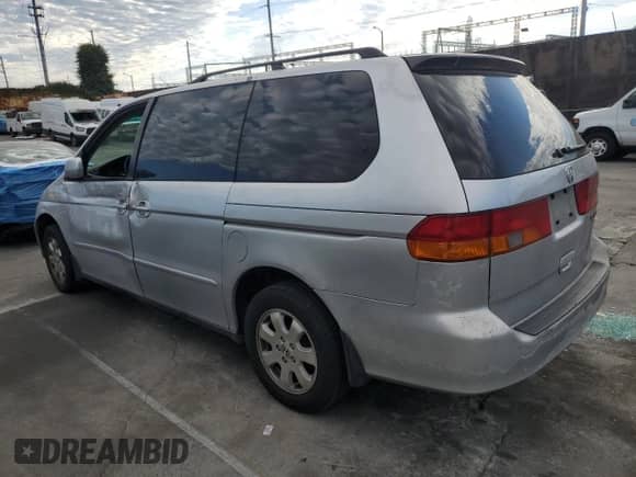2002 Honda Odyssey EX с VIN 5FNRL18662B054002, выставлен на аукционе Copart как лот 86274695 с пробегом 210 011 миль миль и Списание • Salvage title. История ставок и продаж доступна на DreamBid. Изображение 2.