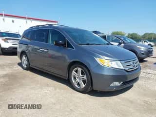 2011 Honda Odyssey Touring with VIN 5FNRL5H92BB093316, listed as a IAAI auction lot 43171437 with 155,403 mi miles and . Bid and sale history available at DreamBid. Image 1.