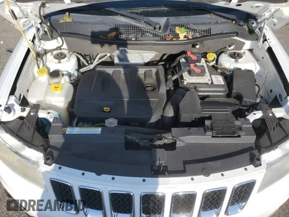 2011 Jeep Compass Latitude z VIN 1J4NT1FB4BD253162, wystawiony jako Copart lot #71593615 z przebiegiem 37 766 mil mil oraz Szkoda całkowita • Salvage title. Historia ofert i sprzedaży dostępna na DreamBid. Obrazek 12.