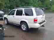 2003 Nissan Pathfinder LE z VIN JN8DR09Y93W817442, wystawiony jako IAAI lot #42513680 z przebiegiem 249 102 mil mil oraz . Historia ofert i sprzedaży dostępna na DreamBid. Obrazek 3.