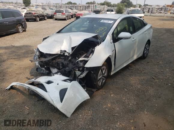 2018 Toyota Prius Two с VIN JTDKBRFU2J3067233, выставлен на аукционе Copart как лот 54717571 с пробегом Не указан миль и Списание • Salvage title. История ставок и продаж доступна на DreamBid. Изображение 2.