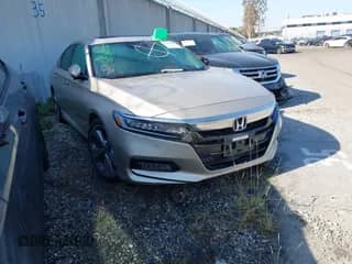 2018 Honda Accord Touring with VIN 1HGCV1F97JA059232, listed as a IAAI auction lot 43447830 with 39,014 mi miles and . Bid and sale history available at DreamBid. Image 1.
