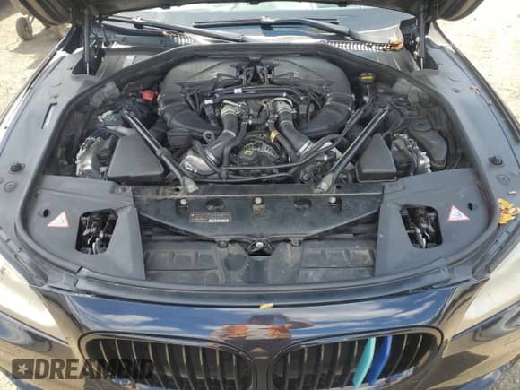 2014 BMW 7 Series 750i xDrive с VIN WBAYB6C59ED225179, выставлен на аукционе Copart как лот 72064245 с пробегом 117 561 миль миль и Списание • Salvage title. История ставок и продаж доступна на DreamBid. Изображение 11.