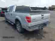 2013 Ford F-150 XL with VIN 1FTFW1CTXDFA06153, listed as a IAAI auction lot 43269175 with 153,732 mi miles and . Bid and sale history available at DreamBid. Image 3.