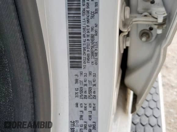 2020 Ram 1500 Lone Star with VIN 1C6RREFM0LN245982, listed as a Copart auction lot 61289665 with 97,036 mi miles and Salvage title. Bid and sale history available at DreamBid. Image 12.