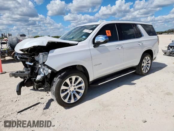 2023 Chevrolet Tahoe Premier with VIN 1GNSCSKD2PR262160, listed as a Copart auction lot 81327285 with 25,164 mi miles and Salvage title. Bid and sale history available at DreamBid. Image 1.