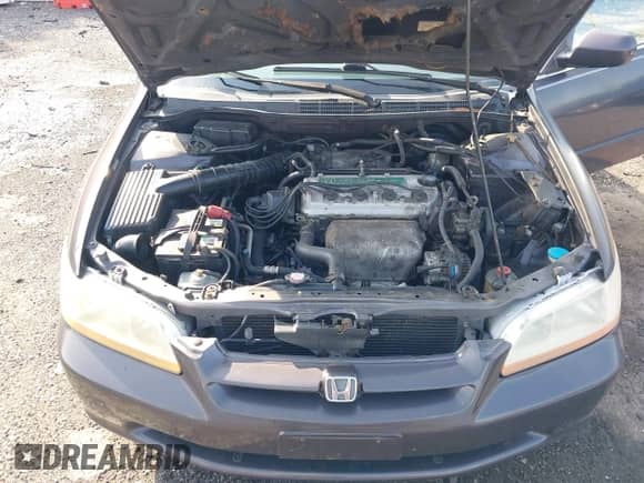 1999 Honda Accord LX z VIN 1HGCG6654XA100896, wystawiony jako IAAI lot #42613354 z przebiegiem 154 176 mil mil oraz . Historia ofert i sprzedaży dostępna na DreamBid. Obrazek 10.