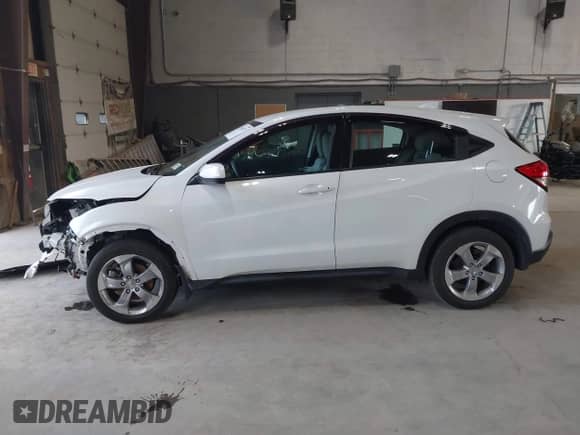2020 Honda HR-V LX z VIN 3CZRU6H35LM716708, wystawiony jako IAAI lot #43345237 z przebiegiem 88 665 mil mil oraz . Historia ofert i sprzedaży dostępna na DreamBid. Obrazek 15.