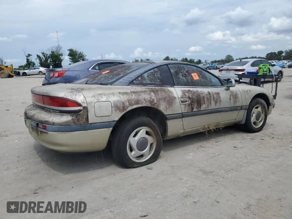 1992 Dodge Stealth with VIN JB3XD44S3NY039083, listed as a Copart auction lot 71502024 with 234,329 mi miles and Clean title. Bid and sale history available at DreamBid. Image 3.