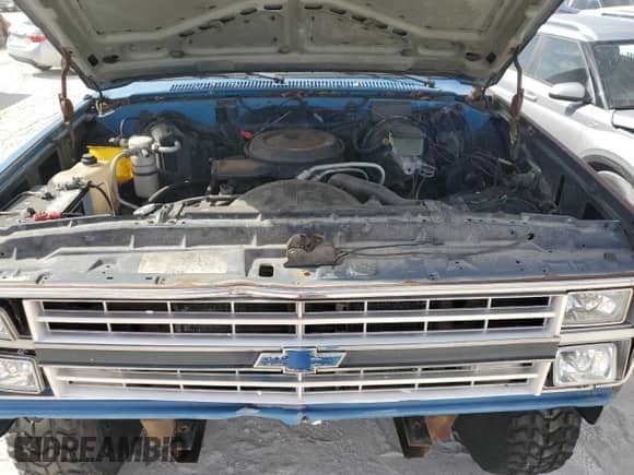 1988 Chevrolet Suburban с VIN 1GNEV16K8JF196619, выставлен на аукционе Copart как лот 78754204 с пробегом 91 294 миль миль и Списание • Salvage title. История ставок и продаж доступна на DreamBid. Изображение 12.