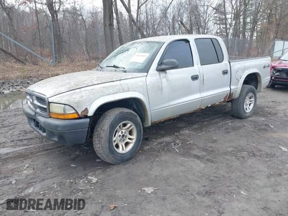 2004 Dodge Dakota Sport z VIN 1D7HG38K54S634958, wystawiony jako IAAI lot #41831018 z przebiegiem 135 917 mil mil oraz . Historia ofert i sprzedaży dostępna na DreamBid. Obrazek 2.