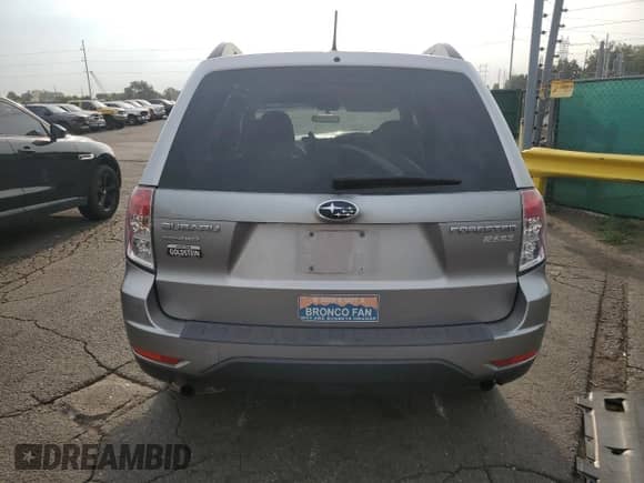 2011 Subaru Forester X Premium with VIN JF2SHADC1BH712339, listed as a Copart auction lot 66895135 with 183,845 mi miles and Salvage title. Bid and sale history available at DreamBid. Image 6.