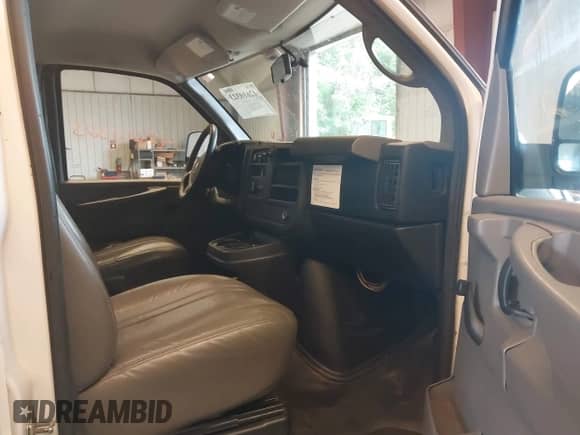 2013 Chevrolet Express Cargo with VIN 1GCSGAFX2D1162792, listed as a IAAI auction lot 42610323 with 199,876 mi miles and . Bid and sale history available at DreamBid. Image 5.