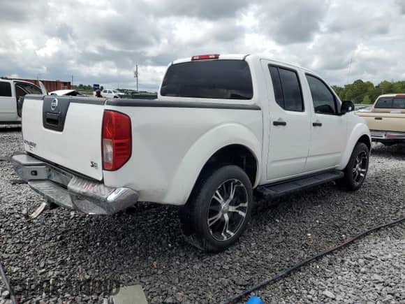 2007 Nissan Frontier SE with VIN 1N6AD07U77C463762, listed as a Copart auction lot 68481535 with 207,499 mi miles and Salvage title. Bid and sale history available at DreamBid. Image 3.