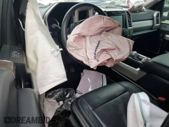 2017 Ford F-250 Lariat with VIN 1FT7W2BT2HED99010, listed as a Copart auction lot 69380955 with 147,941 mi miles and Salvage title. Bid and sale history available at DreamBid. Image 8.