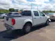 2014 Nissan Frontier SV z VIN 1N6AD0EV9EN726492, wystawiony jako IAAI lot #42749752 z przebiegiem 213 328 mil mil oraz . Historia ofert i sprzedaży dostępna na DreamBid. Obrazek 4.