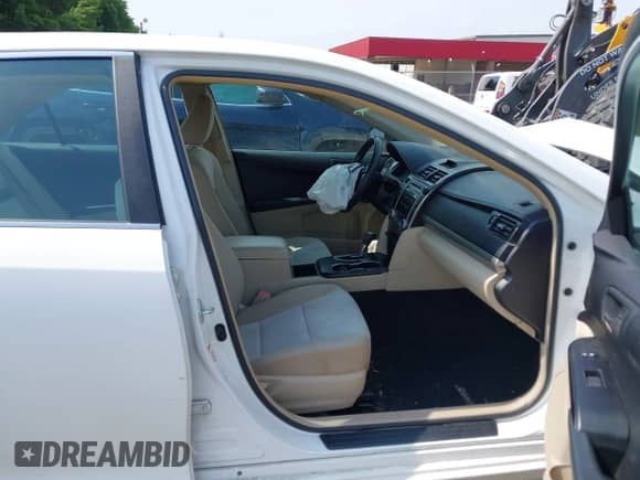 2012 Toyota Camry L z VIN 4T1BF1FKXCU545704, wystawiony jako IAAI lot #42434260 z przebiegiem 143 572 mil mil oraz . Historia ofert i sprzedaży dostępna na DreamBid. Obrazek 5.