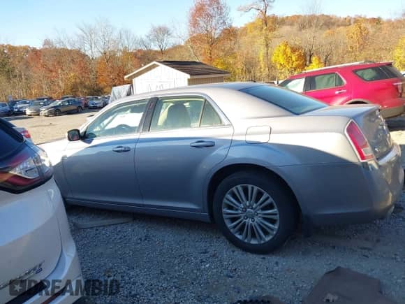 2013 Chrysler 300 with VIN 2C3CCARG0DH595416, listed as a IAAI auction lot 40722790 with 110,377 mi miles and . Bid and sale history available at DreamBid. Image 14.