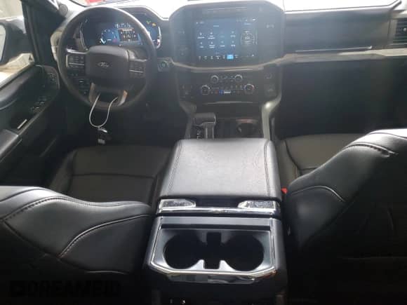 2024 Ford F-150 Lariat with VIN 1FTFW5L83RKE25818, listed as a Copart auction lot 64980445 with 13,717 mi miles and Salvage title. Bid and sale history available at DreamBid. Image 8.